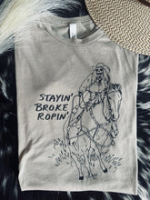 Load image into Gallery viewer, Stayin Broke Ropin Graphic Tee