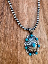 Load image into Gallery viewer, Big Concho Pendant On 6MM Stand of Desert Navajo Pearls
