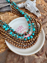 Load image into Gallery viewer, Turquoise Magnesite With Copper Hematite
