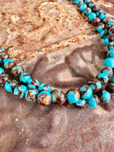 Load image into Gallery viewer, Turquoise Magnesite With Copper Hematite
