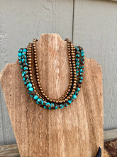 Load image into Gallery viewer, Turquoise Magnesite With Copper Hematite
