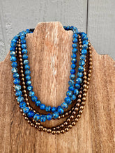 Load image into Gallery viewer, Royal Blue Turquoise Composite With Copper Veining
