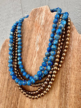 Load image into Gallery viewer, Royal Blue Turquoise Composite With Copper Veining
