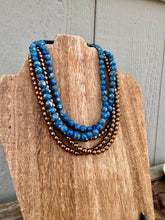 Load image into Gallery viewer, Royal Blue Turquoise Composite With Copper Veining
