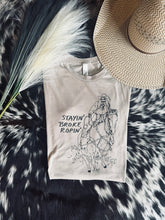 Load image into Gallery viewer, Stayin Broke Ropin Graphic Tee
