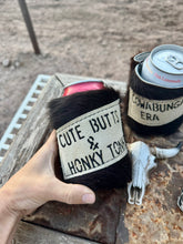 Load image into Gallery viewer, Cowhide Can Koozie- Cute Butts &amp; Honky Tonks, Just A Cowgirl Born To Win, Cowabunga Era
